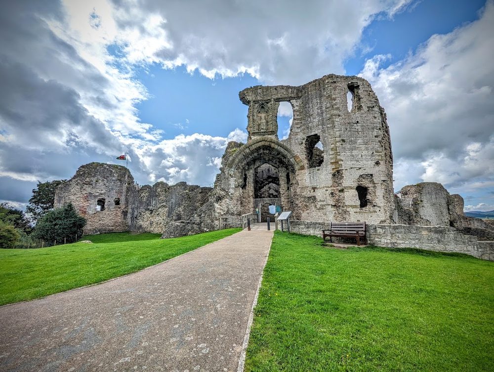 Denbigh Castle, Denbighshire - three octagonal towers around a central octagonal hall, fronted by a barbican and a thirty-foot ditch.